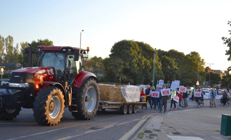 The march weaves through Borehamwood headed up by a tractor