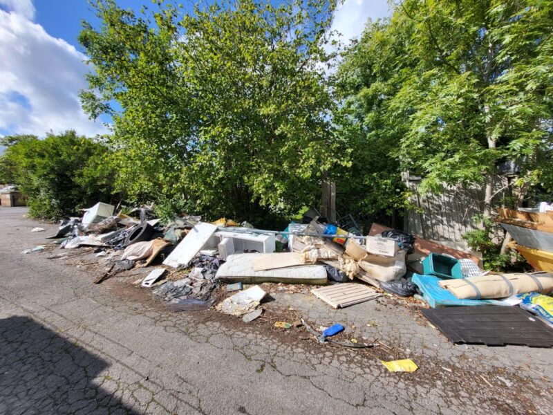 Manor Way service road, fly-tipped